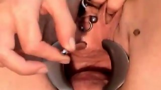 Pierced Bitch Inserts Hugh Objects and Plays with Peehole