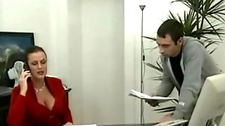 Voluptuous German MILF fucked in her office