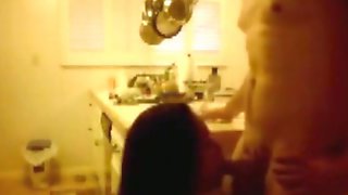 Indonesian Maid sucking her white master dick in kitchen