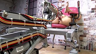 Petite Japanese brunette gets pounded by a fuck machine