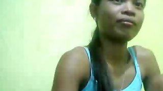 Filipina Flat titted takes off clothes