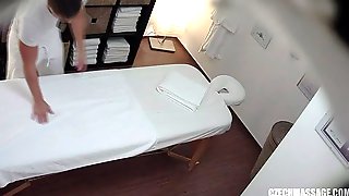 Hidden cam catches a hot girl having an erotic massage