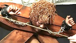 Masochistic black female enjoys bondage
