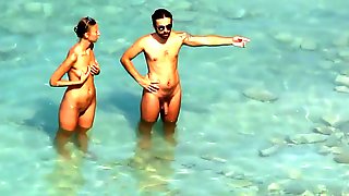 Spy Cam blowjobs on public nude beach