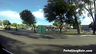 Porta Gloryhole Redhead sucking cock in public