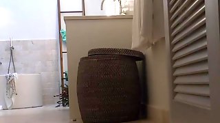 Voyeur hidden cam unaware milf in bathroom