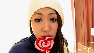 Pretty Asian babe serves the hard dicks at the same time