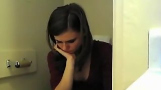 Teen spied in toilet pissing