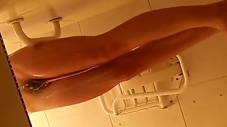 Chick with hairy pussy spied in shower cabin