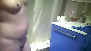 Chubby mature lady on a hidden cam