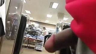 Flashing cock in clothes store