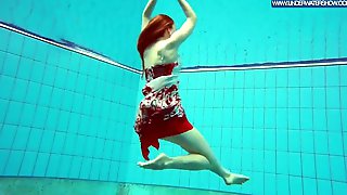 Hot polish redhead swimming in the pool