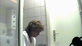 Mature Bathroom Voyeur