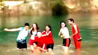 Friends swim in the lake in their underwear