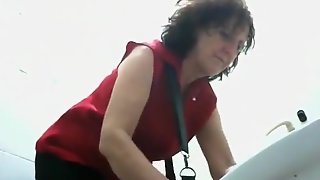 Curvy matures piss in hidden camera porn