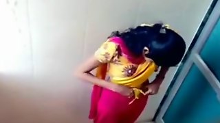 Indian coed girls get caught on tape using the university toilet