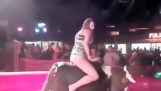 Fabulous babe has her crotch revealed while riding the bull