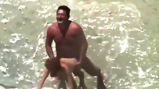 Sex on the beach. Mature couple. She s in love with