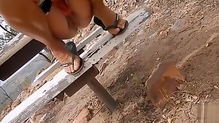 Taking a powerful piss from a shaved mature vagina