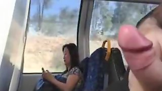 Jerking off on the train across from an Asian woman