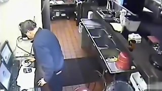 Nasty employee takes a pee into the sink