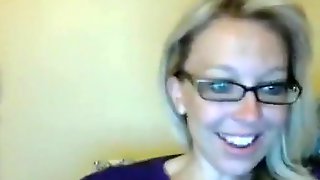 Attractive Blonde Geek Influencing And Stripteasing On Cam