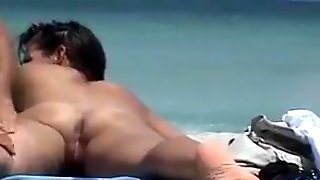 Hot Milf with Big Tits Gets Her Naked Ass Massaged at Beach