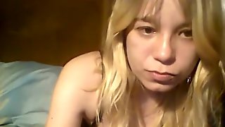 Sexy blonde in her underwear is on live cam chatting and te