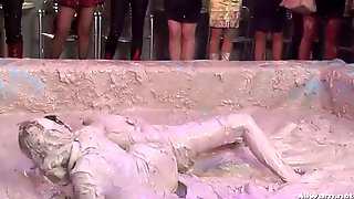 Lesbian catfight in the mud pit