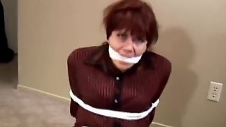 Mature MILF bound and gagged