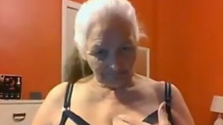 Grandma 68 years shows big tits and pussy