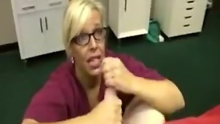 Mature nurse gives a handjob to her horny patient