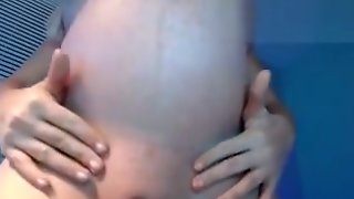 Pregnant amateur Lizz lubricating big belly