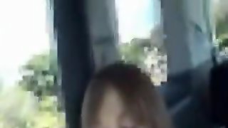 Asian milfs sucks and fucks on her back seat of her car