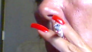 Lovely sexy smoking with super sexy  red nails fingernails