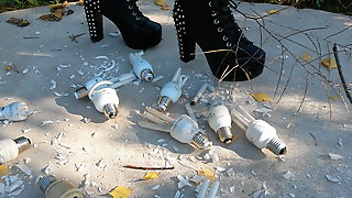 Lady y L crush crush with black boots light bulbs.