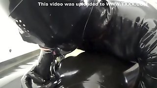 Latex maid becomes rubber creature