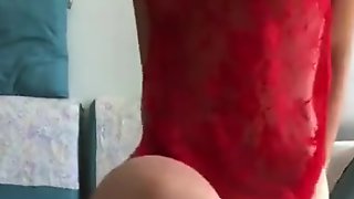 Chinese crossed legs masturbation in red dress