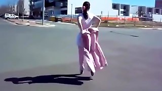 L.ady in Pink Ballet Boots walking outdoors
