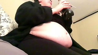 Fat feedee bloats her belly with soda
