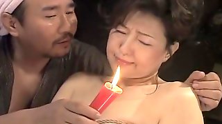 Japanese slut tied up and hot wax action