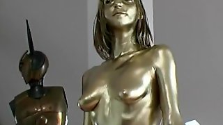 Real gold body painted teen statue
