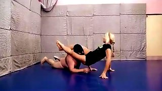 Muscle girl dominates masked fat guy in mixed wrestling