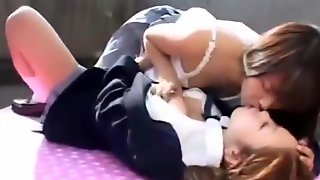 2 Lesbian Japanese student are kissing outside school