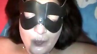 Fat Mature Masked Bitch Sucks Cock And Gets A Huge Facial