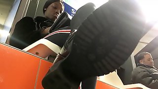 Under a cute ebony chicks boot