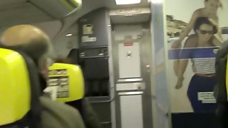 Naked blonde in the airplane masturbates in the bathroom