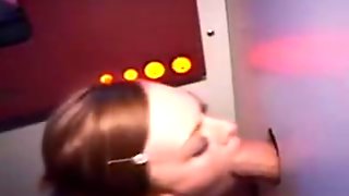 Pretty Redheaded Amateur Taking Facial Through Glory Hole