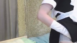 Blonde femboy maid teasing and showing his butt in striped panties