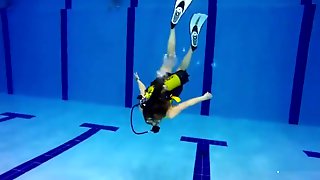 Scuba girl in pool